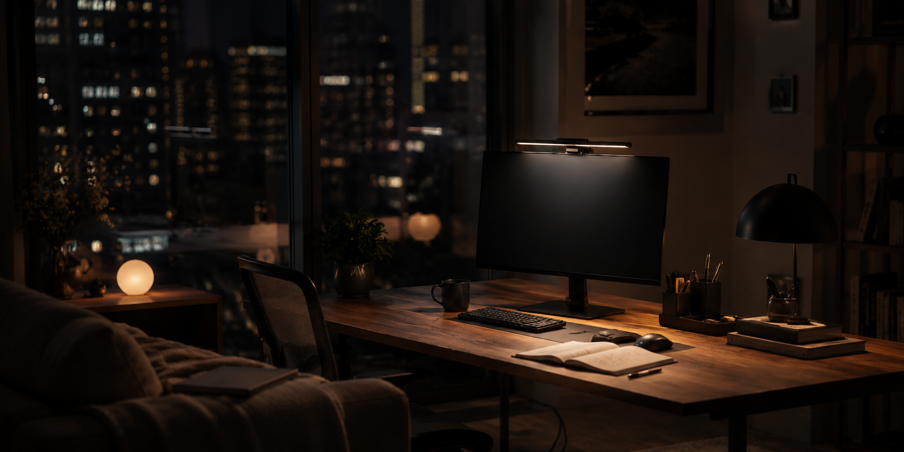 A quiet evening workspace with a Quntis monitor light bar illuminating the desk
