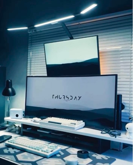 Desk lamp for vertically stacked monitor setup